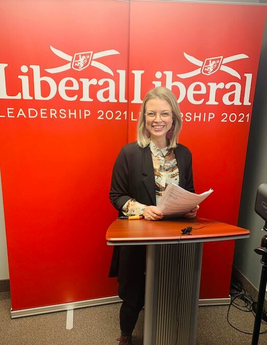 MacPolitics: Top Liberal Emily Lutz Speaks Out On Grit ‘Tumult’ – Urges Khoury  To ‘Postpone AGM To Time When In Person Gatherings Allowed